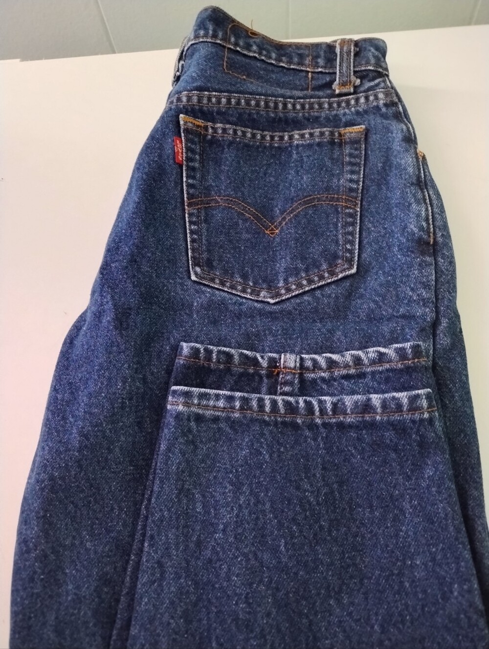 Vintage 1980's-90's Levi's Women's Dark Indigo High-Rise Taper Fit Jeans